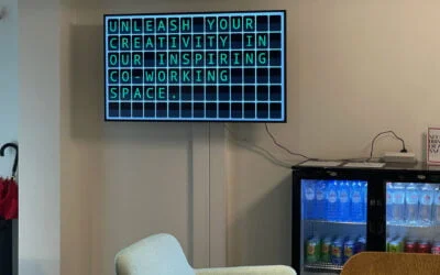 Split-Flap TV motivational board in a Regus coworking space