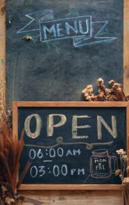 handwritten information on chalkboard