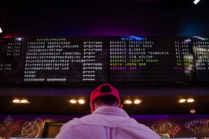 Restaurant owner updating the content of the splitflap boards